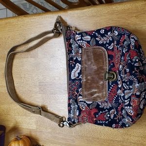 Myra bag , purse, floral print with cowhide front pocket.